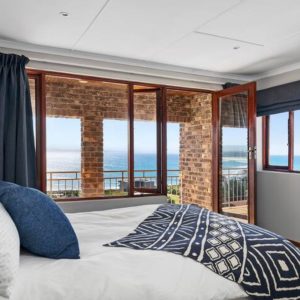 Spacious ocean facing double bedroom with double bed and balcony – price for 2 persons